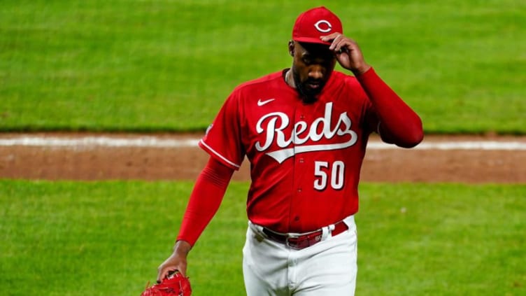 Cincinnati Reds relief pitcher Amir Garrett (50) walks to the dugout after surrendering a three-run home run.