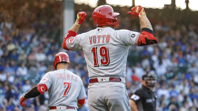 Jul 27, 2021; Chicago, Illinois, USA; Cincinnati Reds first baseman Joey Votto (19) celebrates after hitting a solo home run. Mandatory Credit: Kamil Krzaczynski-USA TODAY Sports