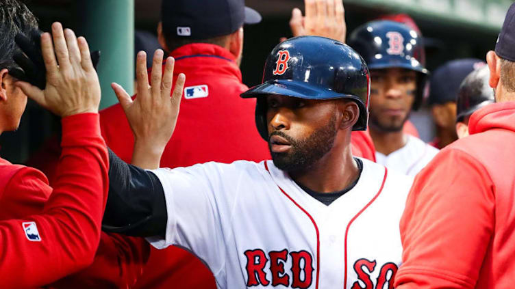 BOSTON, MA - JUNE 13: Jackie Bradley Jr. #19 of the Boston Red Sox returns to the dugout after hitting a three-run home run in the second inning against the Texas Rangers at Fenway Park on June 13, 2019 in Boston, Massachusetts. (Photo by Adam Glanzman/Getty Images)