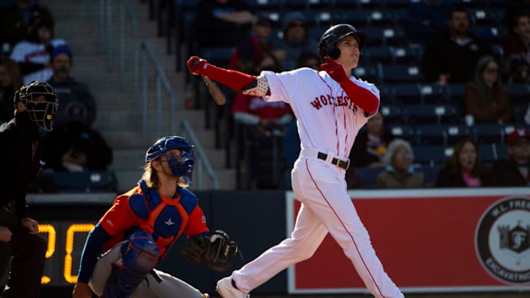 BOSTON, MA - MAY 11: Jarren Duran #24 of the Worcester Red Sox hits a solo home run during the seventh inning of the inaugural game at Polar Park against the Syracuse Mets on May 11, 2021 in Worcester, Massachusetts. It was the first game ever played at Polar Park. (Photo by Billie Weiss/Boston Red Sox/Getty Images)