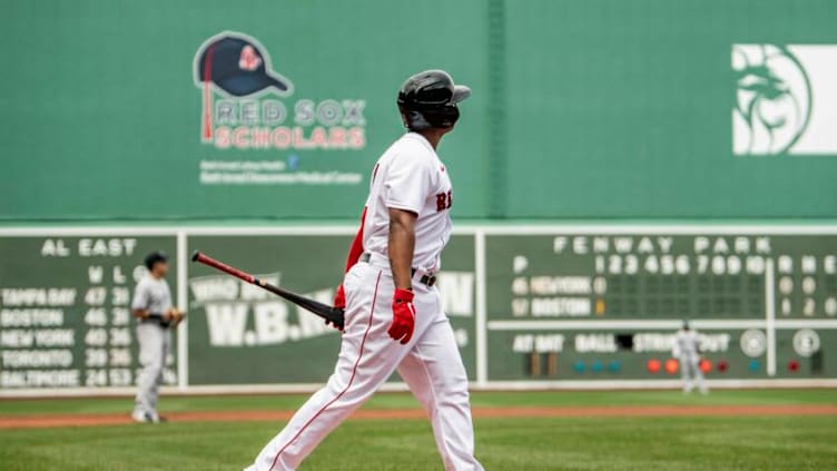 BOSTON, MA - JUNE 27: Rafael Devers #11 of the Boston Red Sox hits a three-run home run during the first inning of a game against the New York Yankees on June 27, 2021 at Fenway Park in Boston, Massachusetts. (Photo by Billie Weiss/Boston Red Sox/Getty Images)