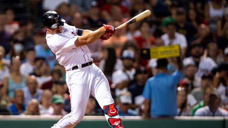 BOSTON, MA - AUGUST 24: Hunter Renfroe #10 of the Boston Red Sox hits a three-run home run during the fourth inning of a game against the Minnesota Twins on August 24, 2021 at Fenway Park in Boston, Massachusetts. (Photo by Billie Weiss/Boston Red Sox/Getty Images)