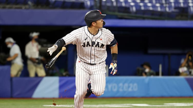 YOKOHAMA, JAPAN - AUGUST 02: Seiya Suzuki #51 of Team Japan hits a solo home run in the fifth inning against Team United States during the knockout stage of men's baseball on day ten of the Tokyo 2020 Olympic Games at Yokohama Baseball Stadium on August 02, 2021 in Yokohama, Kanagawa, Japan. (Photo by Koji Watanabe/Getty Images)