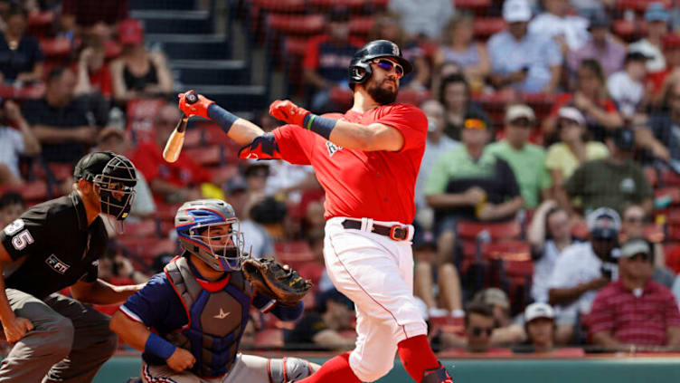 BOSTON, MA - AUGUST 23: Kyle Schwarber #18 of the Boston Red Sox follows through during the sixth inning against the Texas Rangers at Fenway Park on August 23, 2021 in Boston, Massachusetts. (Photo By Winslow Townson/Getty Images)