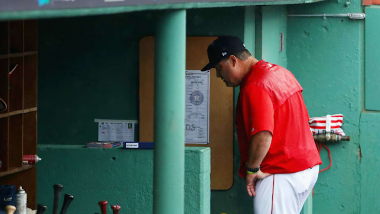 BOSTON, MA - OCTOBER 09: Manager John Farrell of the Boston Red Sox walks through the dugout after being ejected from game four of the American League Division Series against the Houston Astros at Fenway Park on October 9, 2017 in Boston, Massachusetts. (Photo by Maddie Meyer/Getty Images)