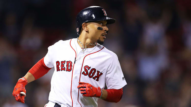 BOSTON, MASSACHUSETTS - SEPTEMBER 04: Mookie Betts #50 of the Boston Red Sox rounds the bases after hitting a three run home run against the Minnesota Twins during the second inning at Fenway Park on September 04, 2019 in Boston, Massachusetts. (Photo by Maddie Meyer/Getty Images)