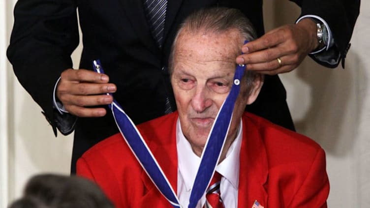 WASHINGTON, DC - FEBRUARY 15: Baseball Hall of Fame member Stan Musial is presented with the 2010 Medal of Freedom by U.S. President Barack Obama during an East Room event at the White House February 15, 2011 in Washington, DC. Obama presented the medal, the highest honor awarded to civilians, to twelve pioneers in sports, labor, politics and arts. (Photo by Alex Wong/Getty Images)