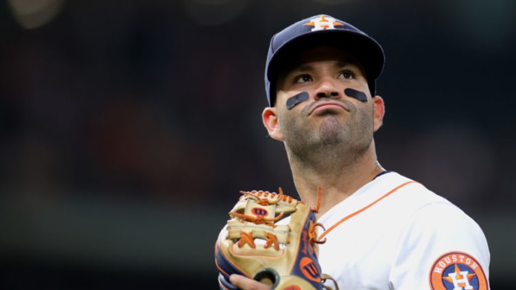 HOUSTON, TEXAS - APRIL 27: Jose Altuve #27 of the Houston Astros looks into the crowd during action against the Seattle Mariners at Minute Maid Park on April 27, 2021 in Houston, Texas. (Photo by Carmen Mandato/Getty Images)