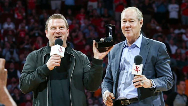 Apr 5, 2018; Houston, TX, USA; Houston Astros owner Jim Crane (right) presents Houston Rockets owner Tilman Fertitta (left) with a world series championship ring during the game against the Portland Trail Blazers at Toyota Center. Mandatory Credit: Troy Taormina-USA TODAY Sports