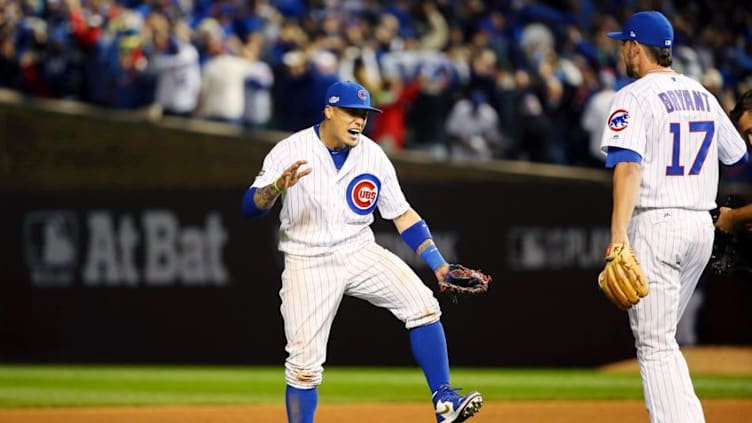 Oct 7, 2016; Chicago, IL, USA; Chicago Cubs second baseman Javier Baez (9) celebrates their win over the San Francisco Giants with third baseman Kris Bryant (17) during game one of the 2016 NLDS playoff baseball series at Wrigley Field. Mandatory Credit: Jerry Lai-USA TODAY Sports