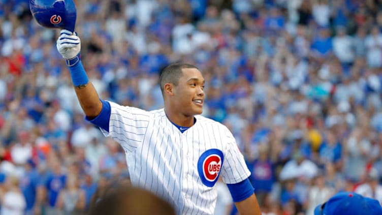 CHICAGO, IL - SEPTEMBER 16: Addison Russell #27 of the Chicago Cubs gives a curtain call after hitting a home run against the St. Louis Cardinals during the eighth inning at Wrigley Field on September 16, 2017 in Chicago, Illinois. (Photo by Jon Durr/Getty Images)