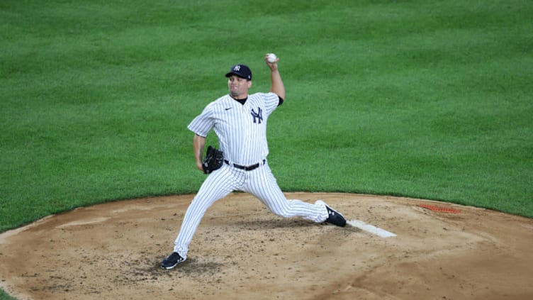 Luis Avilan #70 of the New York Yankees pitches against the Boston Red Sox during their game at Yankee Stadium on August 17, 2020 in New York City. (Photo by Al Bello/Getty Images)