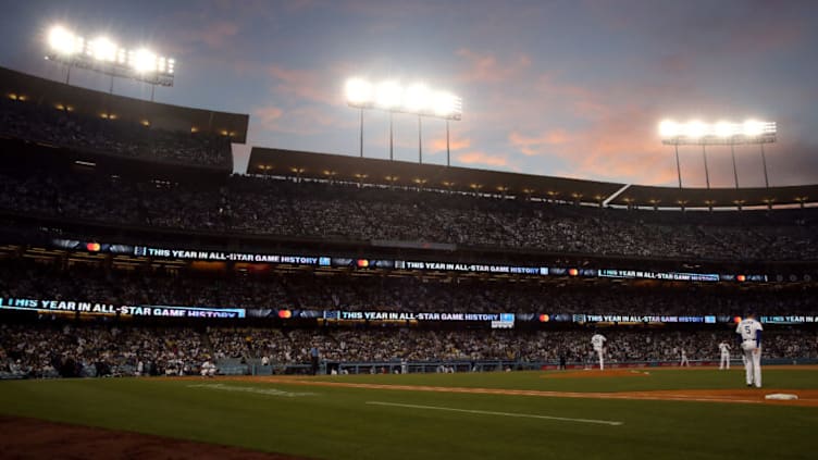 LOS ANGELES, CALIFORNIA - JUNE 02: A general view as Tony Gonsolin #26 of the Los Angeles Dodgers warms up before the start of the fourth inning against the New York Mets at Dodger Stadium on June 02, 2022 in Los Angeles, California. (Photo by Katelyn Mulcahy/Getty Images)