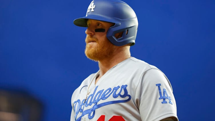 ATLANTA, GA - JUNE 26: Justin Turner #10 of the Los Angeles Dodgers returns to the dugout during the sixth inning against the Atlanta Braves at Truist Park on June 26, 2022 in Atlanta, Georgia. (Photo by Todd Kirkland/Getty Images)