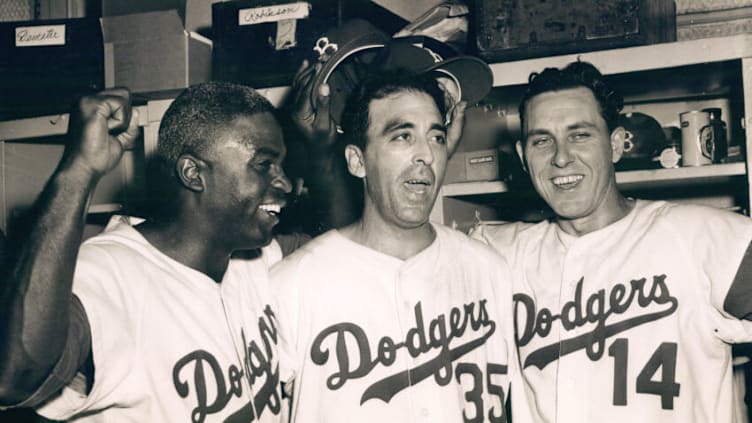 UNSPECIFIED - UNDATED: Jackie Robinson, Sal Maglie and Gil Hodges celebrate another Brooklyn Dogders Victory (Sports Studio Photos/Getty Images)