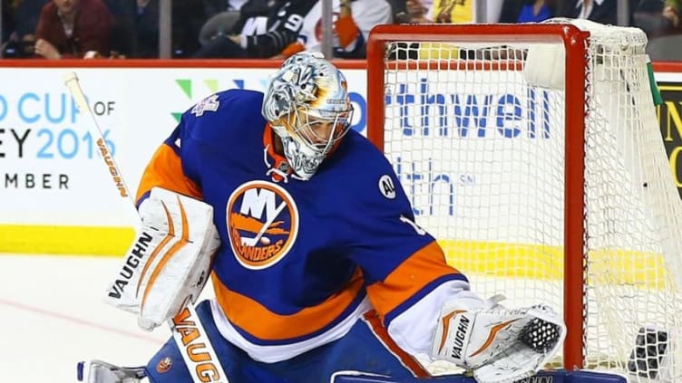 Apr 20, 2016; Brooklyn, NY, USA; New York Islanders goaltender Thomas Greiss (1) makes a save against the Florida Panthers during the third period of game four of the first round of the 2016 Stanley Cup Playoffs against the Florida Panthers at Barclays Center. The Panthers won 2-1. Mandatory Credit: Andy Marlin-USA TODAY Sports