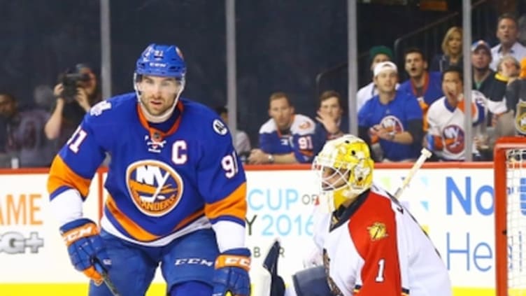 Apr 24, 2016; Brooklyn, NY, USA; New York Islanders center John Tavares (91) sets up in front of the Florida Panthers goaltender Roberto Luongo (1) during the second period in game six of the first round of the 2016 Stanley Cup Playoffs at Barclays Center. The Islanders defeated the Panthers 2-1 to win the series four games to two. Mandatory Credit: Andy Marlin-USA TODAY Sports