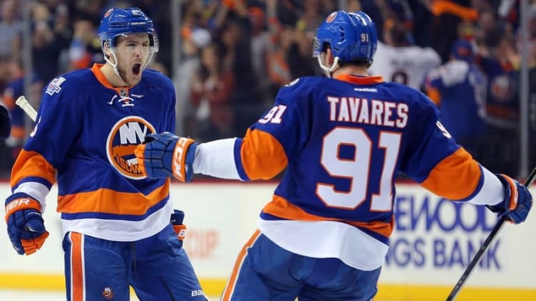 Apr 17, 2016; Brooklyn, NY, USA; New York Islanders defenseman Ryan Pulock (6) celebrates his goal against the Florida Panthers with New York Islanders center John Tavares (91) during the second period of game three of the first round of the 2016 Stanley Cup Playoffs at Barclays Center. Mandatory Credit: Brad Penner-USA TODAY Sports