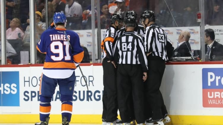 Oct 16, 2016; Brooklyn, NY, USA; Officials review a goal by New York Islanders center John Tavares (91) during the third period against the Anaheim Ducks at Barclays Center. New York Islanders won 3-2 in overtime. Mandatory Credit: Anthony Gruppuso-USA TODAY Sports