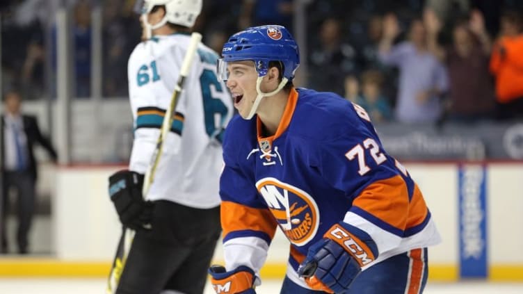 Oct 18, 2016; Brooklyn, NY, USA; New York Islanders left wing Anthony Beauvillier (72) celebrates after scoring a goal against the San Jose Sharks during the second period at Barclays Center. The goal was his first NHL career goal. Mandatory Credit: Brad Penner-USA TODAY Sports