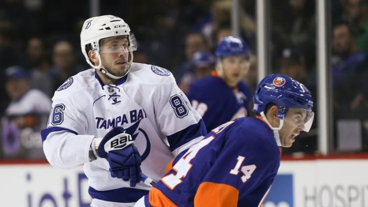 Nov 14, 2016; Brooklyn, NY, USA; Tampa Bay Lightning right wing Nikita Kucherov (86) skates with New York Islanders defenseman Thomas Hickey (14) during the third period at Barclays Center. Tampa Bay won, 4-0. Mandatory Credit: Vincent Carchietta-USA TODAY Sports