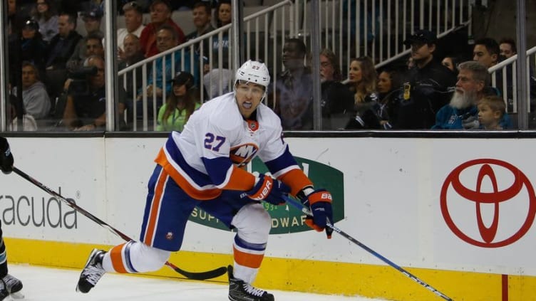 Nov 25, 2016; San Jose, CA, USA; New York Islanders left wing Anders Lee (27) controls the puck in the first period of the game against San Jose Sharks at SAP Center at San Jose. The San Jose Sharks defeated the New York Islanders with a score of 3-2. Mandatory Credit: Stan Szeto-USA TODAY Sports