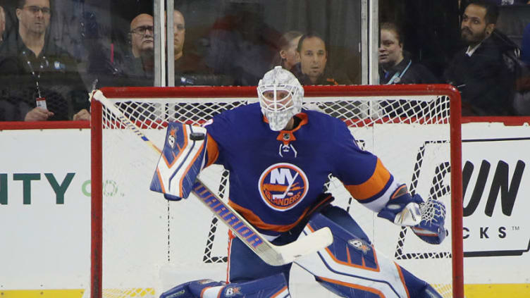 NEW YORK, NEW YORK - SEPTEMBER 18: Robin Lehner #40 of the New York Islanders makes the second period blocker save against the Philadelphia Flyers at the Barclays Center on September 18, 2018 in the Brooklyn borough of New York City. (Photo by Bruce Bennett/Getty Images)