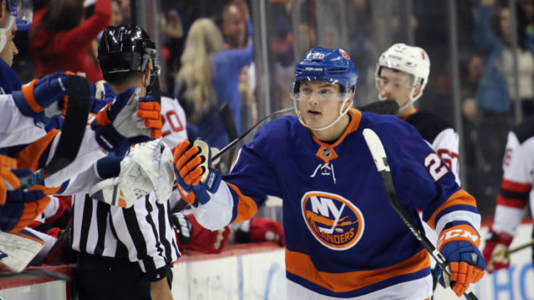 NEW YORK, NEW YORK - SEPTEMBER 20: Kieffer Bellows #20 of the New York Islanders celebrates his powerplay goal at 19:19 of the first period against the New Jersey Devils during a preseason game at the Barclays Center on September 20, 2018 in the Brooklyn borough of New York City. (Photo by Bruce Bennett/Getty Images)