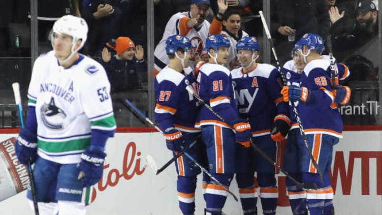 NEW YORK, NEW YORK - NOVEMBER 13: Josh Bailey #12 of the New York Islanders celebrates his first period goal against the Vancouver Canucks at the Barclays Center on November 13, 2018 in the Brooklyn borough of New York City. (Photo by Bruce Bennett/Getty Images)