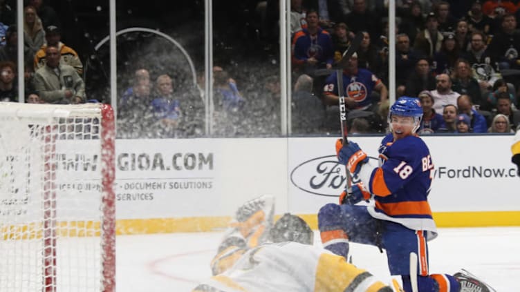 UNIONDALE, NEW YORK - DECEMBER 10: Anthony Beauvillier #18 of the New York Islanders scores a second period goal against Casey DeSmith #1 of the Pittsburgh Penguins at NYCB Live at the Nassau Coliseum on December 10, 2018 in Uniondale, New York. (Photo by Bruce Bennett/Getty Images)