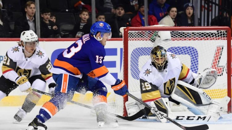 NEW YORK, NEW YORK - DECEMBER 12: Mathew Barzal #13 of the New York Islanders attempts a shot on goal during the second period of the game against the Vegas Golden Knights at Barclays Center on December 12, 2018 in New York City. (Photo by Sarah Stier/Getty Images)