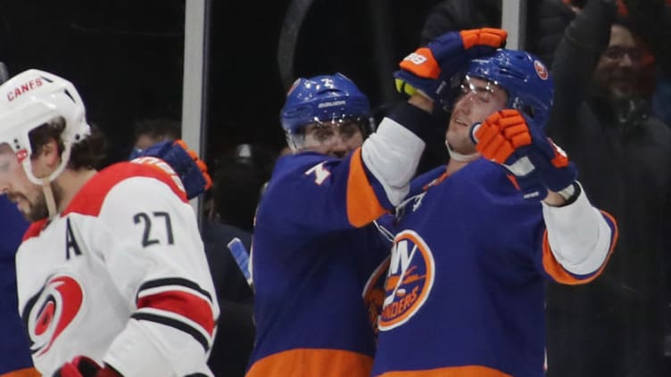 UNIONDALE, NEW YORK - JANUARY 08: Jordan Eberle #7 of the New York Islanders (l) greets Brock Nelson #29 following Nelson's first period goal against the Carolina Hurricanes at NYCB Live at the Nassau Veterans Memorial Coliseum on January 08, 2019 in Uniondale, New York. (Photo by Bruce Bennett/Getty Images)