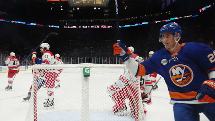 UNIONDALE, NEW YORK - JANUARY 08: Brock Nelson #29 of the New York Islanders celebrates a goal against Curtis McElhinney #35 of the Carolina Hurricanes at NYCB Live at the Nassau Veterans Memorial Coliseum on January 08, 2019 in Uniondale, New York. (Photo by Bruce Bennett/Getty Images)