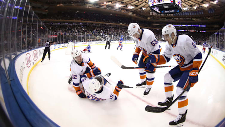 NEW YORK, NEW YORK - JANUARY 10: Josh Bailey #12 of the New York Islanders celebrates after scoring the winning goal against Henrik Lundqvist #30 of the New York Rangers in the third period during their game at Madison Square Garden on January 10, 2019 in New York City. (Photo by Al Bello/Getty Images)