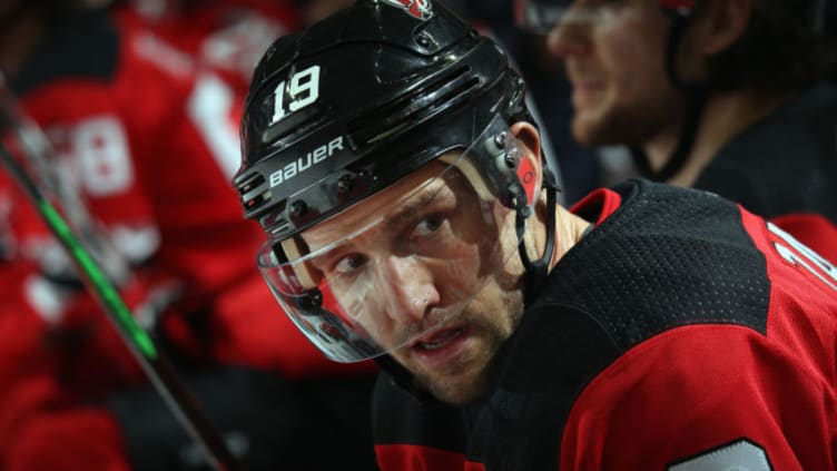 NEWARK, NEW JERSEY - JANUARY 19: Travis Zajac #19 of the New Jersey Devils sits on the bench during the game against the Anaheim Ducks at the Prudential Center on January 19, 2019 in Newark, New Jersey. The Ducks defeated the Devils 3-2. (Photo by Bruce Bennett/Getty Images)