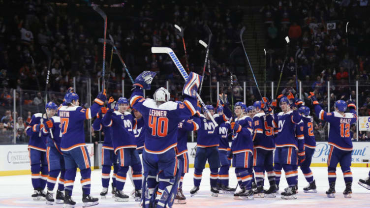 UNIONDALE, NEW YORK - JANUARY 20: Robin Lehner #40 and the New York Islanders celebrate a 3-0 shut-out against the Anaheim Ducks at NYCB Live at the Nassau Veterans Memorial Coliseum on January 20, 2019 in Uniondale, New York. (Photo by Bruce Bennett/Getty Images)