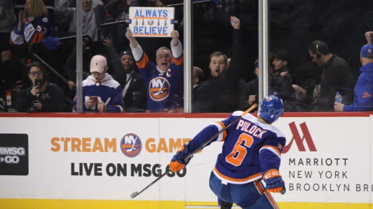 NEW YORK, NEW YORK - FEBRUARY 09: Ryan Pulock #6 of the New York Islanders celebrates his game winning goal at 2:23 of overtime against the Colorado Avalanche at the Barclays Center on February 09, 2019 in the Brooklyn borough of New York City. The Islanders defeated the Avalanche 4-3. (Photo by Bruce Bennett/Getty Images)