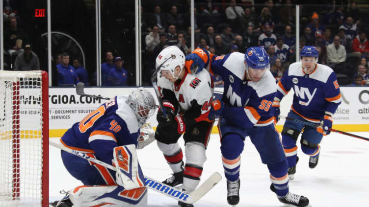 UNIONDALE, NEW YORK - MARCH 05: Robin Lehner #40 andJohnny Boychuk #55 of the New York Islanders defend against Jean-Gabriel Pageau #44 of the Ottawa Senators during the first period at NYCB Live's Nassau Coliseum on March 05, 2019 in Uniondale, New York. (Photo by Bruce Bennett/Getty Images)