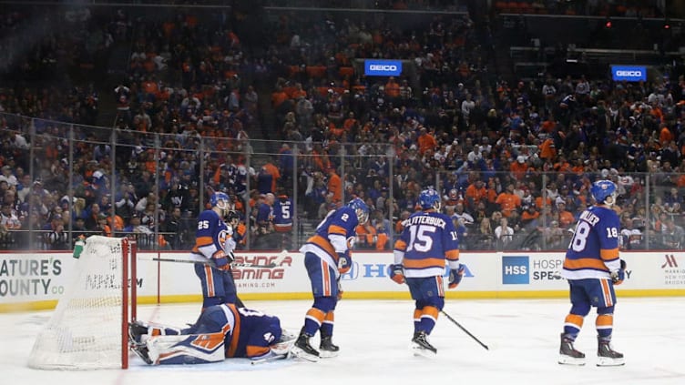 NEW YORK, NEW YORK - APRIL 26: The New York Islanders leave the ice following a 1-0 loss to the Carolina Hurricanes in Game One of the Eastern Conference Second Round during the 2019 NHL Stanley Cup Playoffs at the Barclays Center on April 26, 2019 in the Brooklyn borough of New York City. (Photo by Bruce Bennett/Getty Images)