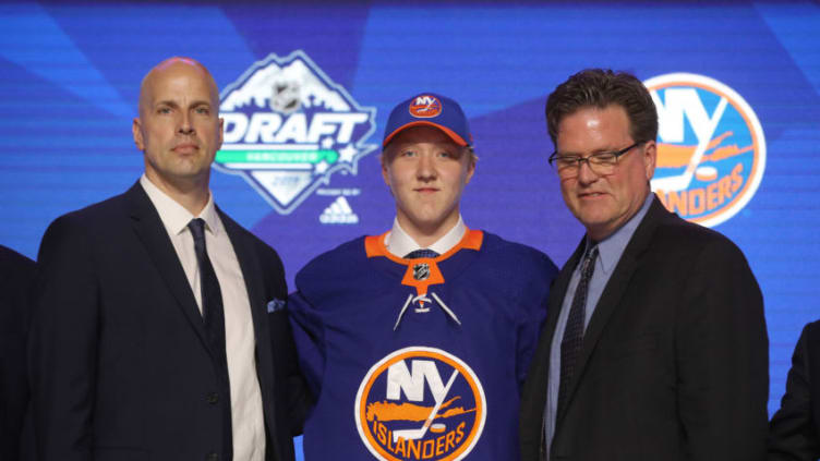 Simon Holmstrom reacts after being selected twenty-third overall by the New York Islanders (Photo by Bruce Bennett/Getty Images)