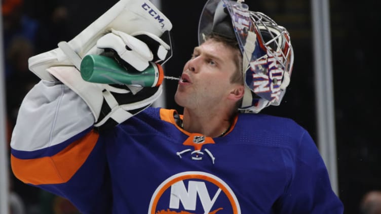 UNIONDALE, NEW YORK - OCTOBER 04: Semyon Varlamov #40 of the New York Islanders takes a first period water break during the game against the Washington Capitals at NYCB Live's Nassau Coliseum on October 04, 2019 in Uniondale, New York. (Photo by Bruce Bennett/Getty Images)
