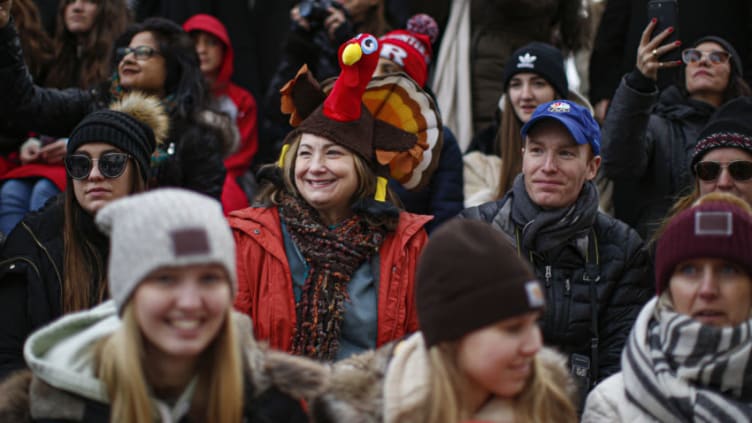 NEW YORK, NY - NOVEMBER 28: People attend the annual Macy's Thanksgiving parade on November 28, 2019 in New York City. (Photo by Kena Betancur/Getty Images)