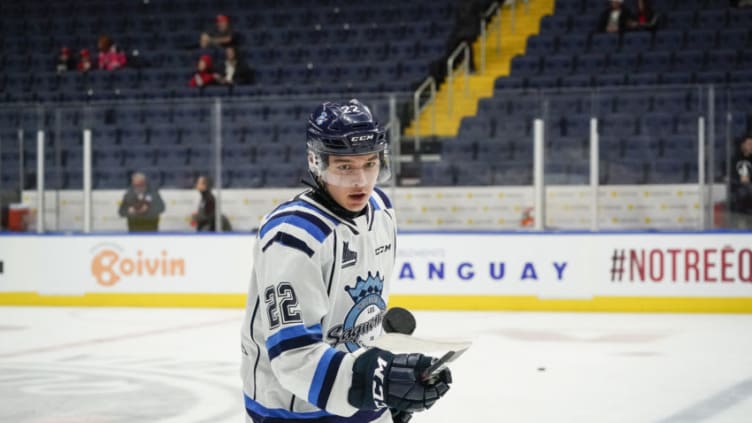 QUEBEC CITY, QC - OCTOBER 11: William Dufour #22 of the Chicoutimi Sagueneens skates prior to his QMJHL hockey game at the Videotron Center on October 11, 2019 in Quebec City, Quebec, Canada. (Photo by Mathieu Belanger/Getty Images)