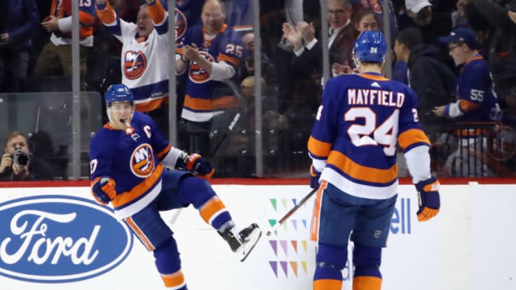 NEW YORK, NEW YORK - NOVEMBER 30: Anders Lee #27 of the New York Islanders celebrates his goal at 1:18 of the first period against the Columbus Blue Jackets at the Barclays Center on November 30, 2019 in the Brooklyn borough of New York City. (Photo by Bruce Bennett/Getty Images)