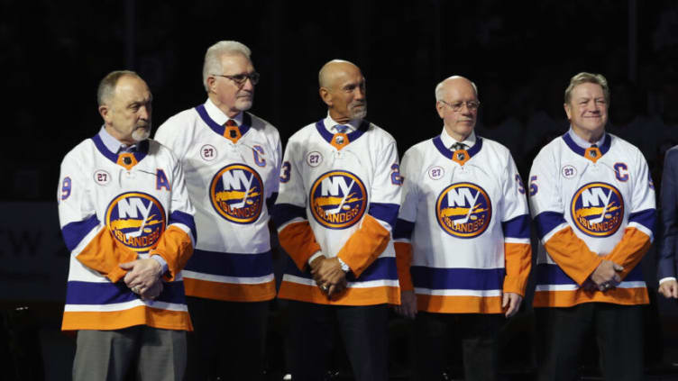 UNIONDALE, NEW YORK - FEBRUARY 21: (L-R) Bryan Trottier, Clarke Gillies, Bobby Nystrom, Billy Smith and Denis Potvin attend the retirement ceremony for John Tonelli that celebrated his career with the New York Islanders and saw his jersey retired and raised to the rafters of NYCB Live's Nassau Coliseum on February 21, 2020 in Uniondale, New York. (Photo by Bruce Bennett/Getty Images)