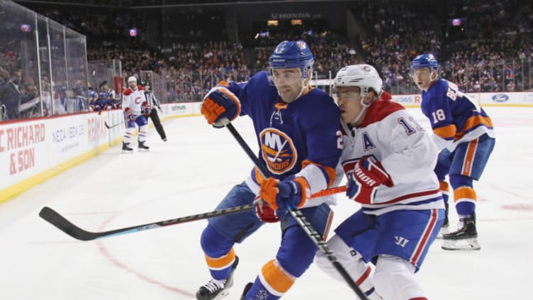 NEW YORK, NEW YORK - MARCH 03: Nick Leddy #2 of the New York Islanders and Brendan Gallagher #11 of the Montreal Canadiens battle for position during the first period at the Barclays Center on March 03, 2020 in the Brooklyn borough of New York City. (Photo by Bruce Bennett/Getty Images)