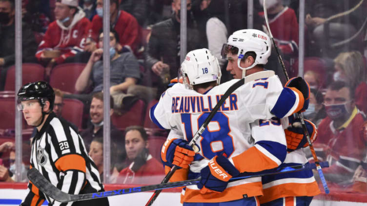 MONTREAL, QC - NOVEMBER 04: Brock Nelson #29 of the New York Islanders celebrates his goal with teammate Anthony Beauvillier #18 during the first period against the Montreal Canadiens at Centre Bell on November 4, 2021 in Montreal, Canada. (Photo by Minas Panagiotakis/Getty Images)