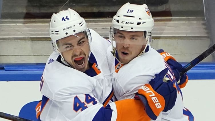 TORONTO, ONTARIO - AUGUST 05: Jean-Gabriel Pageau #44 of the New York Islanders (L) celebrates his goal at 16:26 of the first period against the Florida Panthers and is joined by Anthony Beauvillier #18 (R) in Game Three of the Eastern Conference Qualification Round prior to the 2020 NHL Stanley Cup Playoffs at Scotiabank Arena on August 5, 2020 in Toronto, Ontario, Canada. (Photo by Andre Ringuette/Freestyle Photo/Getty Images)