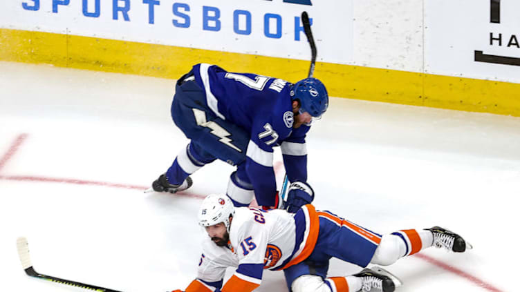 EDMONTON, ALBERTA - SEPTEMBER 07: Cal Clutterbuck #15 of the New York Islanders is checked by Victor Hedman #77 of the Tampa Bay Lightning during the second period in Game One of the Eastern Conference Final during the 2020 NHL Stanley Cup Playoffs at Rogers Place on September 07, 2020 in Edmonton, Alberta, Canada. (Photo by Bruce Bennett/Getty Images)