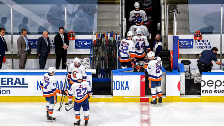 The New York Islanders leave the ice after their 8-2 defeat (Photo by Bruce Bennett/Getty Images)